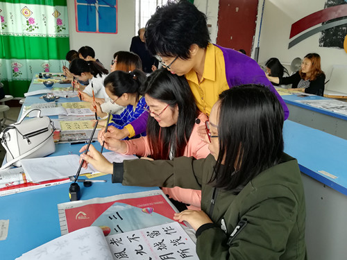翰墨飘香进校园  名家指点促发展